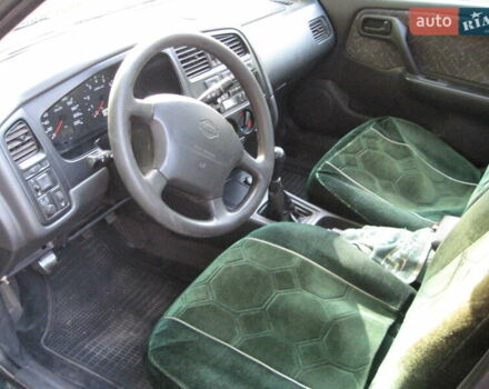 Зелений Ніссан Прімера, об'ємом двигуна 2 л та пробігом 301 тис. км за 1800 $, фото 7 на Automoto.ua