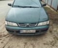 Зеленый Ниссан Примера, объемом двигателя 2 л и пробегом 250 тыс. км за 1900 $, фото 1 на Automoto.ua