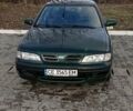 Зеленый Ниссан Примера, объемом двигателя 2 л и пробегом 397 тыс. км за 1800 $, фото 1 на Automoto.ua