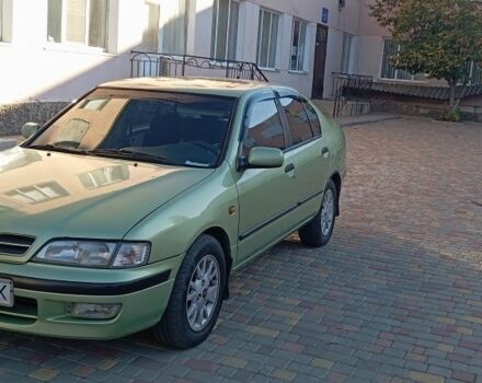Зелений Ніссан Прімера, об'ємом двигуна 1.6 л та пробігом 318 тис. км за 2800 $, фото 4 на Automoto.ua