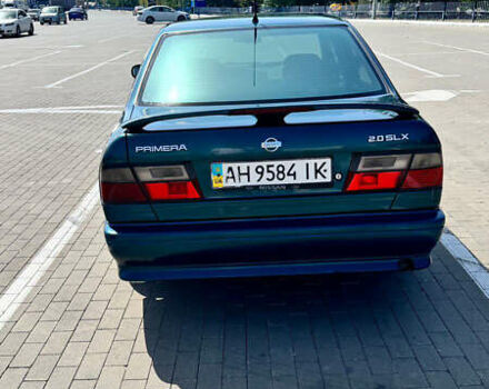 Зеленый Ниссан Примера, объемом двигателя 2 л и пробегом 270 тыс. км за 1800 $, фото 1 на Automoto.ua