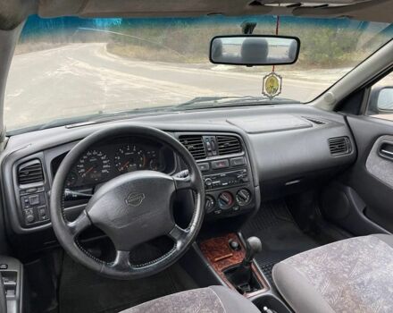 Зелений Ніссан Прімера, об'ємом двигуна 2 л та пробігом 300 тис. км за 1300 $, фото 4 на Automoto.ua