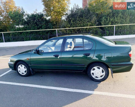 Зелений Ніссан Прімера, об'ємом двигуна 2 л та пробігом 220 тис. км за 3300 $, фото 4 на Automoto.ua