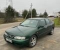 Зелений Ніссан Прімера, об'ємом двигуна 2 л та пробігом 300 тис. км за 1300 $, фото 1 на Automoto.ua