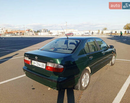 Зелений Ніссан Прімера, об'ємом двигуна 2 л та пробігом 220 тис. км за 3300 $, фото 5 на Automoto.ua