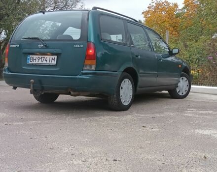 Зелений Ніссан Прімера, об'ємом двигуна 1.6 л та пробігом 225 тис. км за 1499 $, фото 3 на Automoto.ua