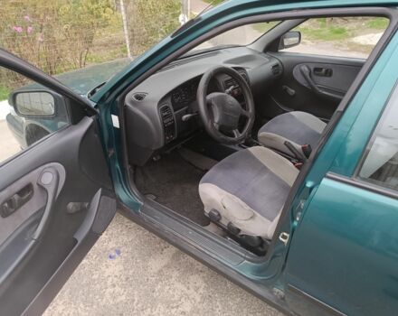 Зелений Ніссан Прімера, об'ємом двигуна 1.6 л та пробігом 225 тис. км за 1499 $, фото 14 на Automoto.ua