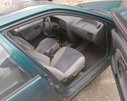 Зелений Ніссан Прімера, об'ємом двигуна 1.6 л та пробігом 225 тис. км за 1499 $, фото 5 на Automoto.ua