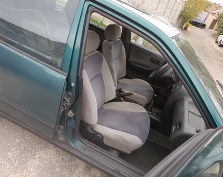 Зелений Ніссан Прімера, об'ємом двигуна 1.6 л та пробігом 225 тис. км за 1499 $, фото 13 на Automoto.ua