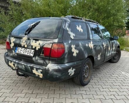 Зеленый Ниссан Примера, объемом двигателя 1.9 л и пробегом 390 тыс. км за 1100 $, фото 2 на Automoto.ua