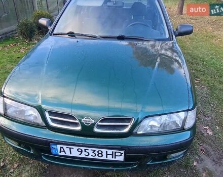 Зелений Ніссан Прімера, об'ємом двигуна 2 л та пробігом 315 тис. км за 2700 $, фото 4 на Automoto.ua