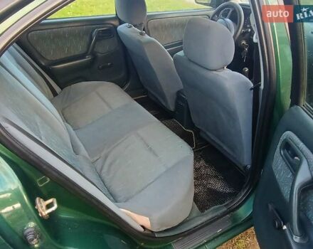 Зелений Ніссан Прімера, об'ємом двигуна 2 л та пробігом 315 тис. км за 2700 $, фото 1 на Automoto.ua