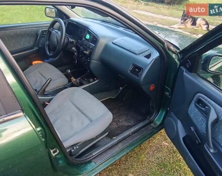 Зелений Ніссан Прімера, об'ємом двигуна 2 л та пробігом 315 тис. км за 2700 $, фото 2 на Automoto.ua