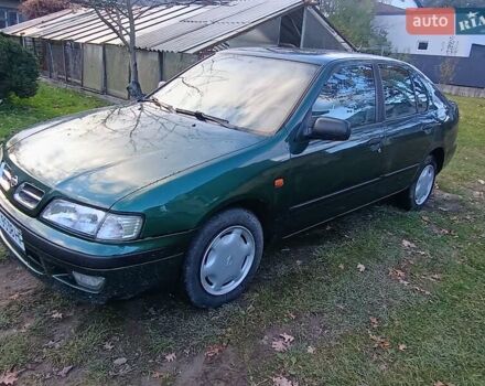 Зелений Ніссан Прімера, об'ємом двигуна 2 л та пробігом 315 тис. км за 2700 $, фото 8 на Automoto.ua