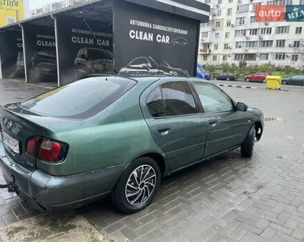 Зелений Ніссан Прімера, об'ємом двигуна 1.8 л та пробігом 295 тис. км за 2200 $, фото 5 на Automoto.ua