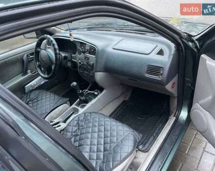 Зелений Ніссан Прімера, об'ємом двигуна 1.8 л та пробігом 295 тис. км за 2200 $, фото 10 на Automoto.ua