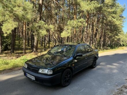 Зелений Ніссан Прімера, об'ємом двигуна 1.6 л та пробігом 250 тис. км за 700 $, фото 1 на Automoto.ua