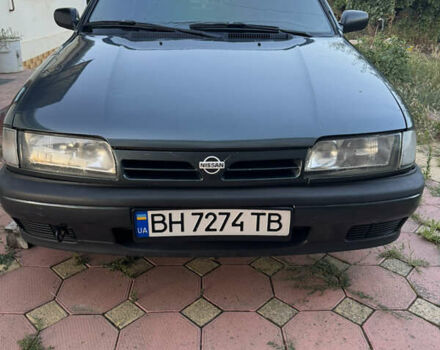 Зеленый Ниссан Примера, объемом двигателя 2 л и пробегом 390 тыс. км за 1800 $, фото 1 на Automoto.ua
