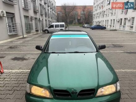 Зелений Ніссан Прімера, об'ємом двигуна 1.6 л та пробігом 470 тис. км за 2800 $, фото 1 на Automoto.ua