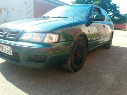 Зеленый Ниссан Примера, объемом двигателя 2 л и пробегом 250 тыс. км за 1900 $, фото 1 на Automoto.ua