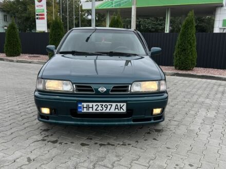 Зеленый Ниссан Примера, объемом двигателя 2 л и пробегом 236 тыс. км за 3700 $, фото 1 на Automoto.ua