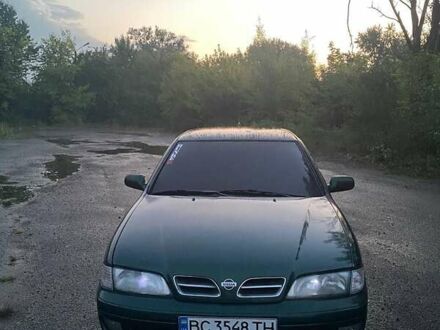 Зеленый Ниссан Примера, объемом двигателя 2 л и пробегом 340 тыс. км за 2200 $, фото 1 на Automoto.ua