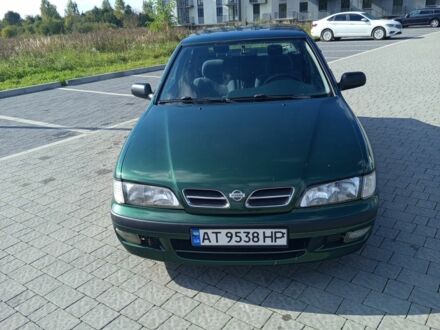 Зеленый Ниссан Примера, объемом двигателя 2 л и пробегом 326 тыс. км за 1850 $, фото 1 на Automoto.ua