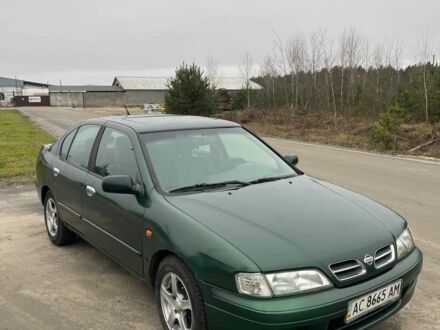 Зелений Ніссан Прімера, об'ємом двигуна 2 л та пробігом 300 тис. км за 1300 $, фото 1 на Automoto.ua