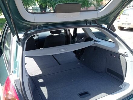 Зеленый Ниссан Примера, объемом двигателя 2 л и пробегом 201 тыс. км за 5350 $, фото 1 на Automoto.ua