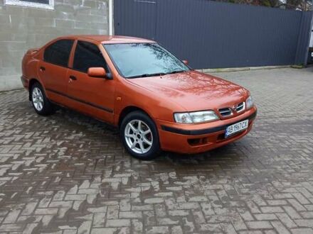 Оранжевый Ниссан Примера, объемом двигателя 1.6 л и пробегом 293 тыс. км за 1800 $, фото 1 на Automoto.ua