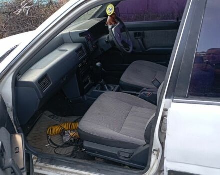 Білий Ніссан Пульсар, об'ємом двигуна 1.5 л та пробігом 150 тис. км за 558 $, фото 6 на Automoto.ua