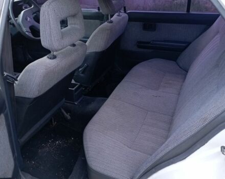 Білий Ніссан Пульсар, об'ємом двигуна 1.5 л та пробігом 150 тис. км за 558 $, фото 5 на Automoto.ua