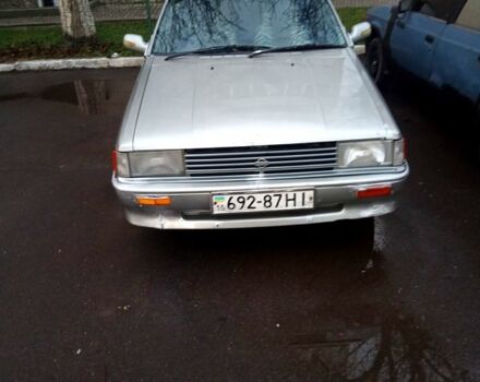 Сірий Ніссан Пульсар, об'ємом двигуна 1.5 л та пробігом 111 тис. км за 500 $, фото 4 на Automoto.ua