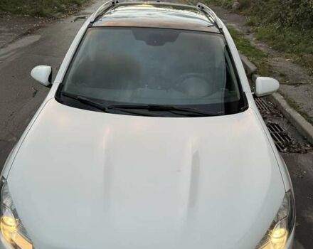 Белый Ниссан Кашкай, объемом двигателя 2 л и пробегом 159 тыс. км за 11200 $, фото 4 на Automoto.ua