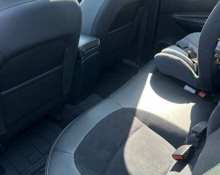 Черный Ниссан Кашкай, объемом двигателя 1.6 л и пробегом 170 тыс. км за 12700 $, фото 11 на Automoto.ua