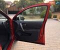 Красный Ниссан Кашкай, объемом двигателя 2 л и пробегом 210 тыс. км за 7700 $, фото 15 на Automoto.ua