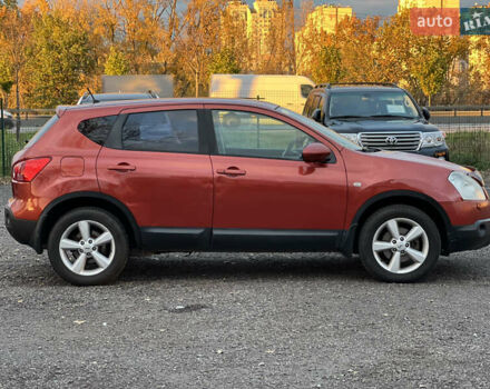 Ніссан Кашкай 2008 у Києві на Automoto.ua Червоний Ніссан Кашкай, об'ємом двигуна 2 л та пробігом 226 тис. км за 8000 $, фото 27 на Automoto.ua