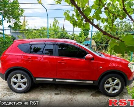 Красный Ниссан Кашкай, объемом двигателя 2 л и пробегом 160 тыс. км за 8200 $, фото 1 на Automoto.ua