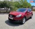 Красный Ниссан Кашкай, объемом двигателя 2 л и пробегом 185 тыс. км за 10600 $, фото 1 на Automoto.ua