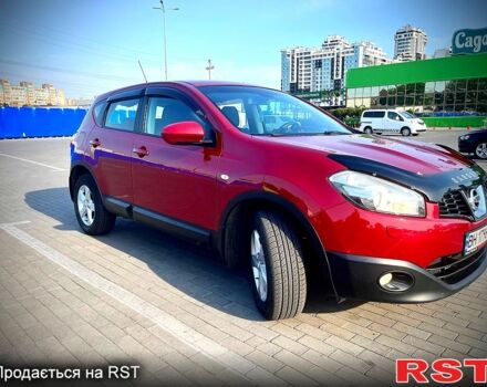 Красный Ниссан Кашкай, объемом двигателя 2 л и пробегом 130 тыс. км за 11300 $, фото 1 на Automoto.ua