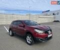 Красный Ниссан Кашкай, объемом двигателя 2 л и пробегом 193 тыс. км за 10700 $, фото 1 на Automoto.ua