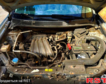 Серый Ниссан Кашкай, объемом двигателя 1.6 л и пробегом 260 тыс. км за 4200 $, фото 7 на Automoto.ua