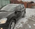 Черный Ниссан Кашкай 2, объемом двигателя 1.5 л и пробегом 230 тыс. км за 9600 $, фото 1 на Automoto.ua