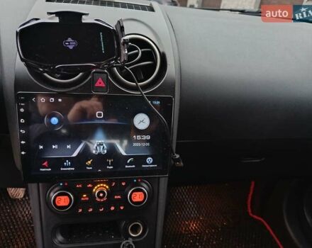 Черный Ниссан Кашкай 2, объемом двигателя 1.46 л и пробегом 275 тыс. км за 8650 $, фото 50 на Automoto.ua