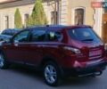 Червоний Ніссан Кашкай 2, об'ємом двигуна 2 л та пробігом 138 тис. км за 11999 $, фото 4 на Automoto.ua