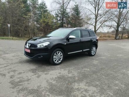 Красный Ниссан Кашкай 2, объемом двигателя 2 л и пробегом 234 тыс. км за 13100 $, фото 1 на Automoto.ua