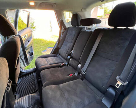 Белый Ниссан Rogue, объемом двигателя 2.5 л и пробегом 205 тыс. км за 11800 $, фото 5 на Automoto.ua