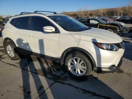 Белый Ниссан Rogue, объемом двигателя 2 л и пробегом 92 тыс. км за 2200 $, фото 1 на Automoto.ua