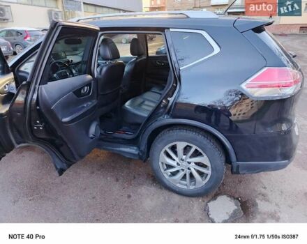 Черный Ниссан Rogue, объемом двигателя 2.49 л и пробегом 261 тыс. км за 12700 $, фото 3 на Automoto.ua