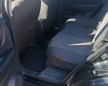 Черный Ниссан Rogue, объемом двигателя 2.5 л и пробегом 90 тыс. км за 15000 $, фото 5 на Automoto.ua